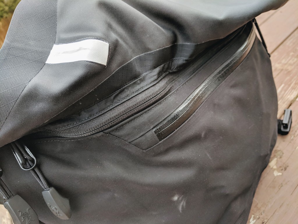 Arc'teryx LEAF Courier 15 messenger bag review main flap entry zipper closed exterior pocket view