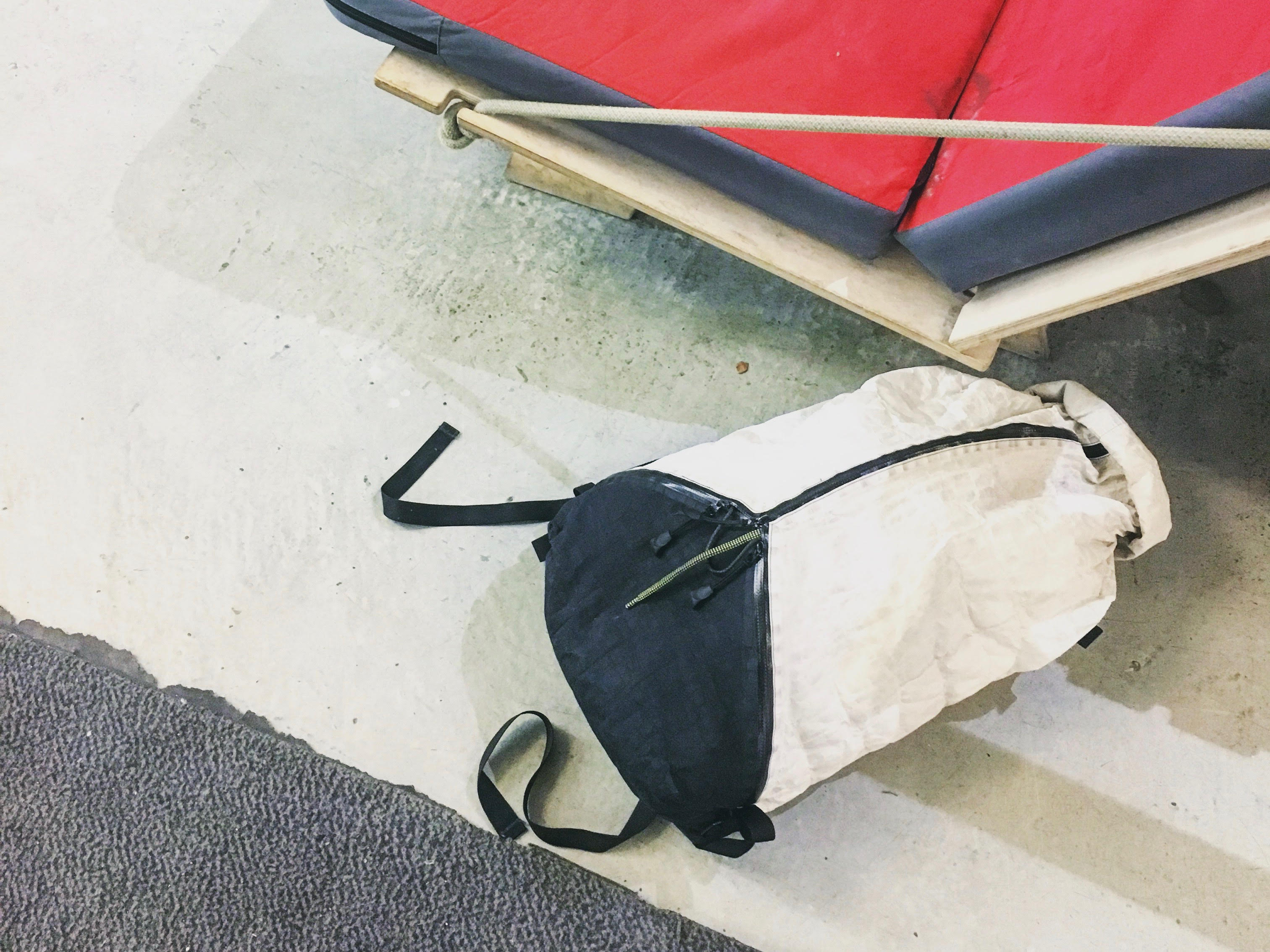 dyborg gear interview Q&A tri zip roll top backpack white on floor