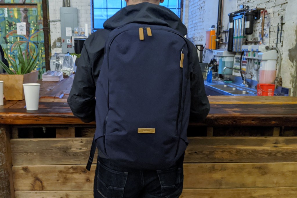 Bellroy Transit Review wearing in bar on  back