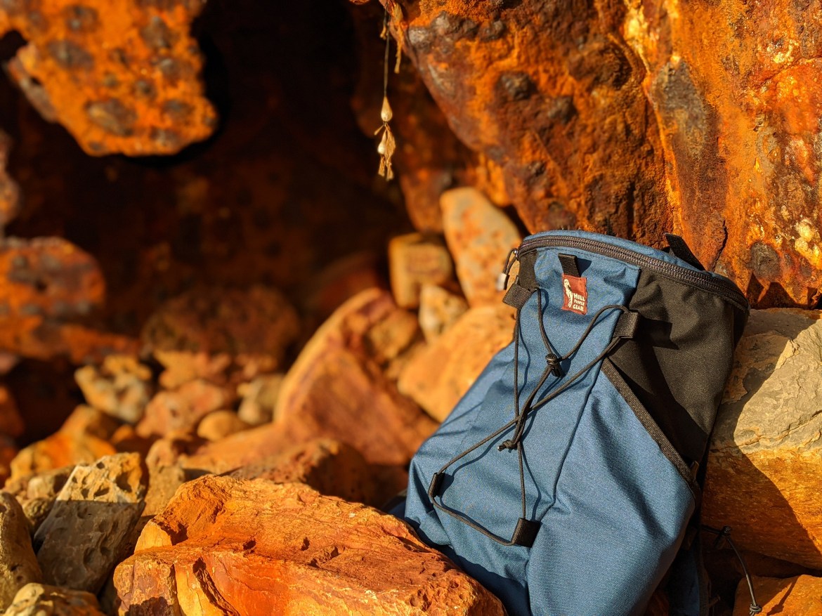 Hill People Gear Junction Review on rocks teal