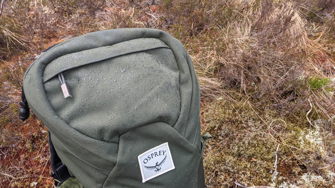 Osprey Archeon 24 backpack review recycled canvas water resistant detail top pocket white label logo