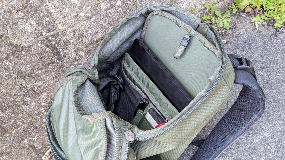 Osprey Archeon 24 backpack review interior view with laptop and pen in organiser sections padded laptop sleeve