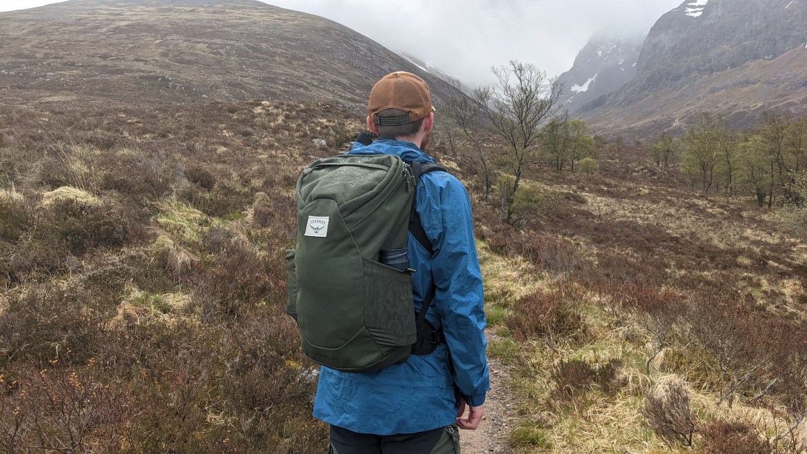 Osprey Archeon 24 backpack review hiking backpack in Scottish mountains bottle pockets green canvas