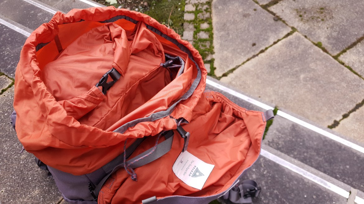 Salkan backpacker travel bag review mainpack lid open hand numbered label orange interior